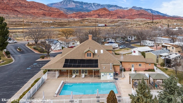 53 Pioneer Way, Hurricane, UT 84737 - view of swimming pool featuring a mountain view, a fenced backyard, and a patio area