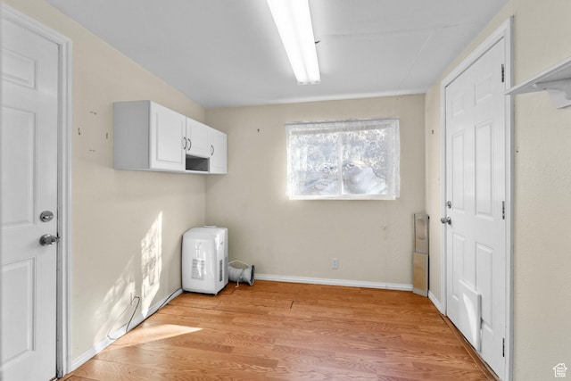 53 Pioneer Way, Hurricane, UT 84737 - washroom featuring light wood-style flooring and baseboards