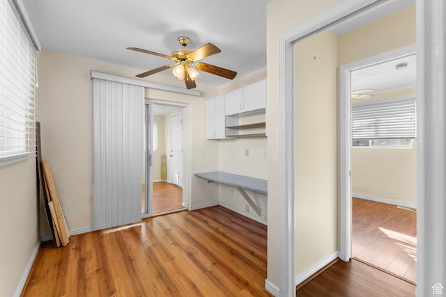 53 Pioneer Way, Hurricane, UT 84737 - unfurnished bedroom with wood finished floors and ceiling fan