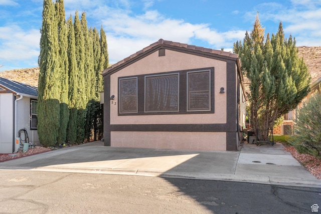 53 Pioneer Way, Hurricane, UT 84737 - view of front of home with stucco siding