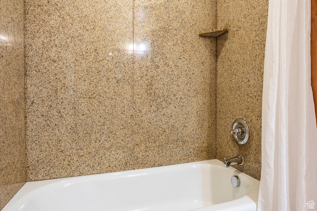 full bath featuring shower / tub combo