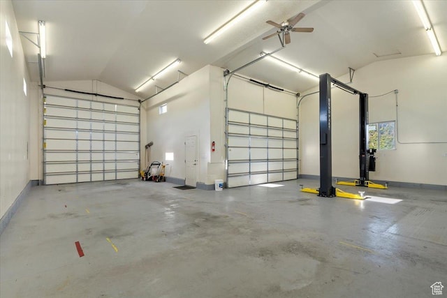 garage with baseboards and ceiling fan