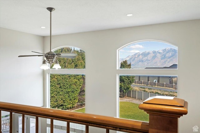 room details with recessed lighting, a ceiling fan, and a mountain view