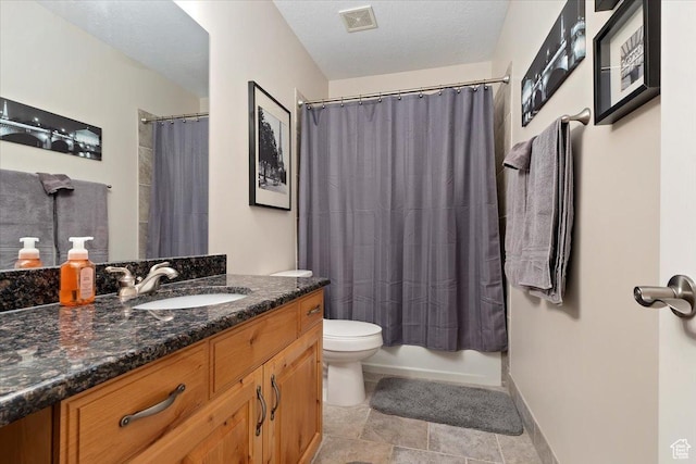 full bath with toilet, visible vents, vanity, and baseboards