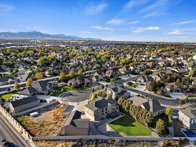 bird's eye view featuring a mountain view and a residential view