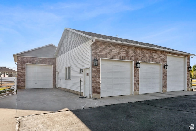 garage with fence