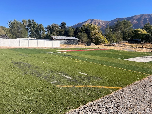 6916 N 2750 W, Honeyville, UT 84314 - view of yard with fence and a mountain view