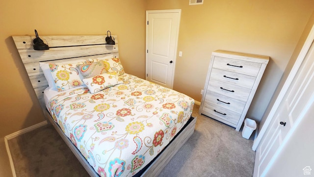 2511 Redcliff Rd Unit 1-E, Moab, UT 84532 - bedroom featuring visible vents, baseboards, and carpet floors