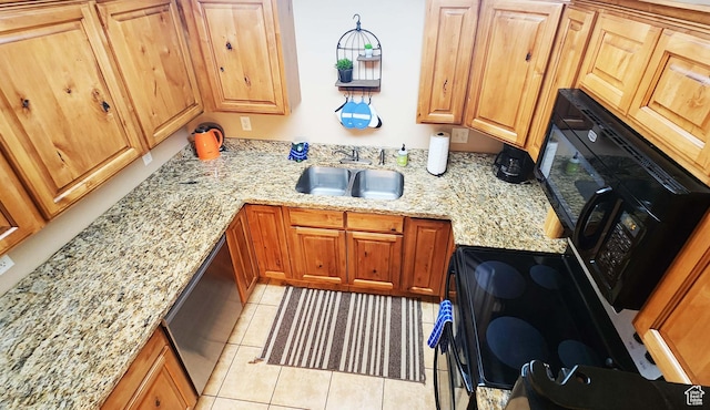 2511 Redcliff Rd Unit 1-E, Moab, UT 84532 - kitchen featuring stainless steel dishwasher, light stone countertops, light tile patterned floors, and a sink