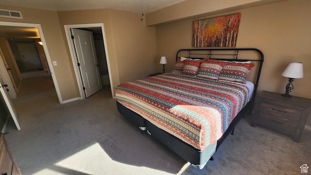 2511 Redcliff Rd Unit 1-E, Moab, UT 84532 - bedroom with carpet, visible vents, and baseboards