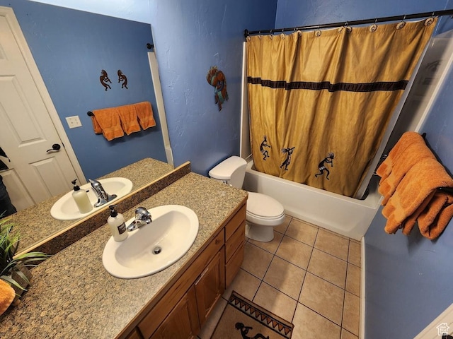3448 Tierra Del Sol Dr, Moab, UT 84532 - bathroom featuring toilet, shower / bathtub combination with curtain, vanity, and tile patterned flooring