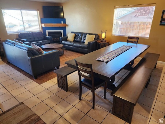 3448 Tierra Del Sol Dr, Moab, UT 84532 - living room featuring light tile patterned flooring and a fireplace