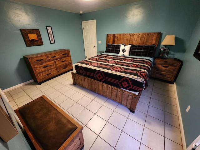 3448 Tierra Del Sol Dr, Moab, UT 84532 - bedroom with baseboards and light tile patterned flooring