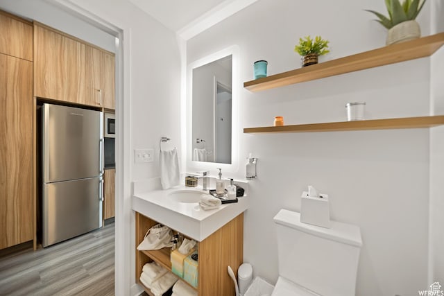 2670 Canyons Resort Dr Unit 208, Park City, UT 84098 - bathroom featuring vanity, toilet, and wood finished floors