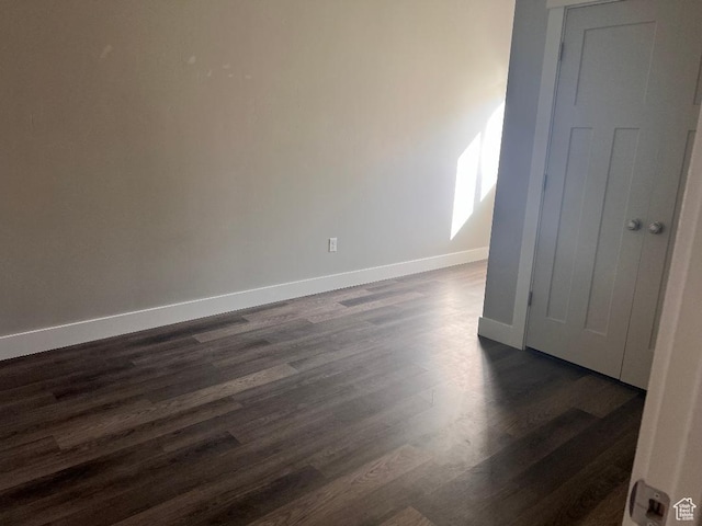 6932 N 2750 W, Honeyville, UT 84314 - spare room with baseboards and dark wood-style flooring