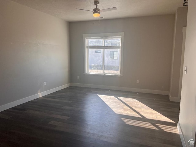 6932 N 2750 W, Honeyville, UT 84314 - empty room with wood finished floors, a ceiling fan, and baseboards