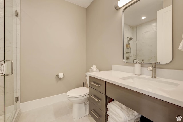 4971 S Cattail Way, Washington, UT 84780 - bathroom featuring vanity, baseboards, a stall shower, tile patterned floors, and toilet