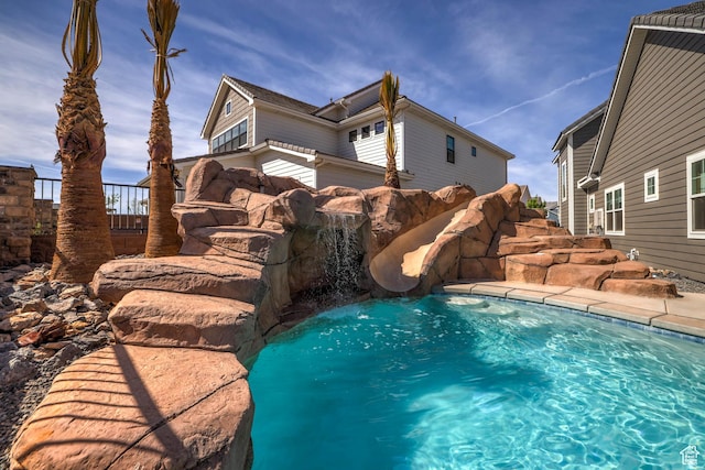 4971 S Cattail Way, Washington, UT 84780 - view of pool featuring fence and a water slide