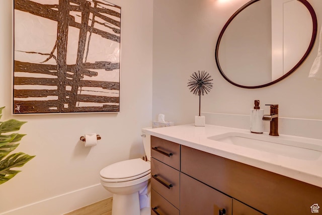 4971 S Cattail Way, Washington, UT 84780 - bathroom with toilet, wood finished floors, vanity, and baseboards
