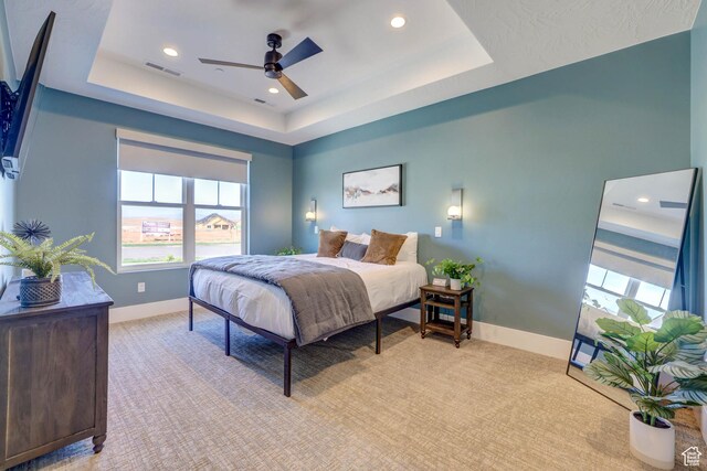 4971 S Cattail Way, Washington, UT 84780 - bedroom with a raised ceiling, light carpet, baseboards, and visible vents