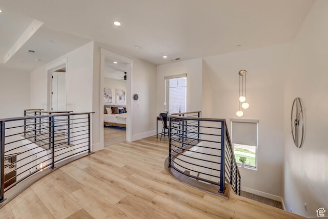 4971 S Cattail Way, Washington, UT 84780 - hall with visible vents, recessed lighting, wood finished floors, an upstairs landing, and baseboards