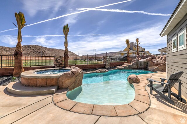 4971 S Cattail Way, Washington, UT 84780 - view of swimming pool featuring a fenced in pool, a patio, an in ground hot tub, and a fenced backyard