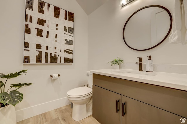4971 S Cattail Way, Washington, UT 84780 - half bath with vanity, toilet, wood finished floors, lofted ceiling, and baseboards