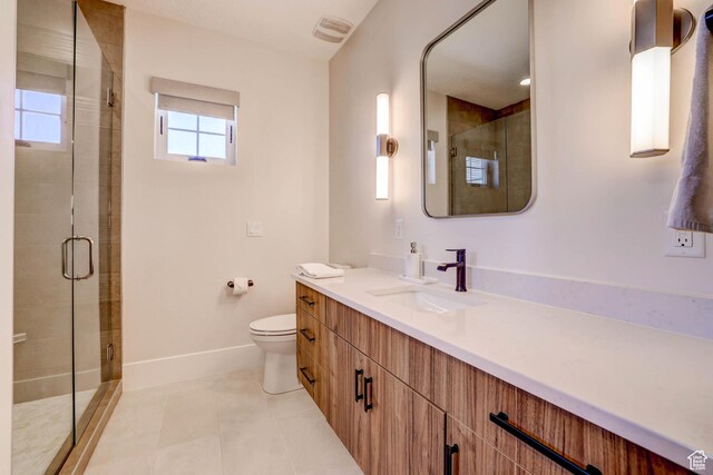 4971 S Cattail Way, Washington, UT 84780 - bathroom featuring toilet, vanity, baseboards, and a stall shower