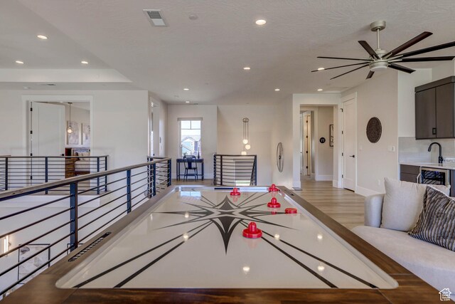 4971 S Cattail Way, Washington, UT 84780 - game room with recessed lighting, light wood-style flooring, baseboards, and visible vents