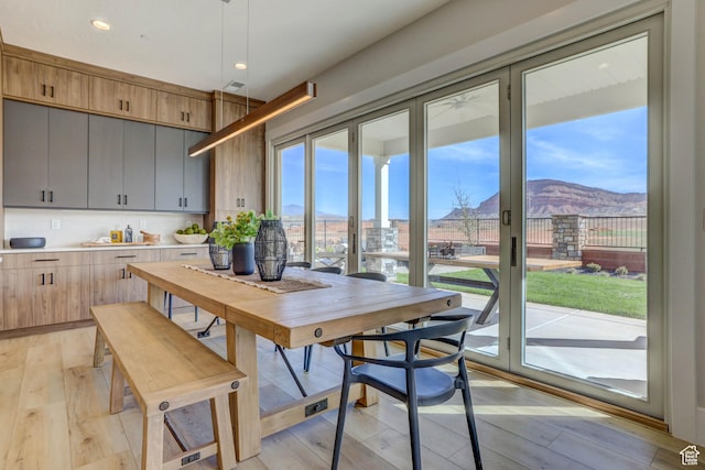 4971 S Cattail Way, Washington, UT 84780 - dining space featuring light wood finished floors, a mountain view, visible vents, and recessed lighting