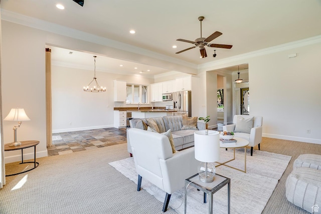49 W Oberland Ct, Midway, UT 84049 - living room featuring crown molding, ceiling fan, baseboards, recessed lighting, and a chandelier