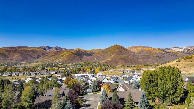 property view of mountains featuring a residential view