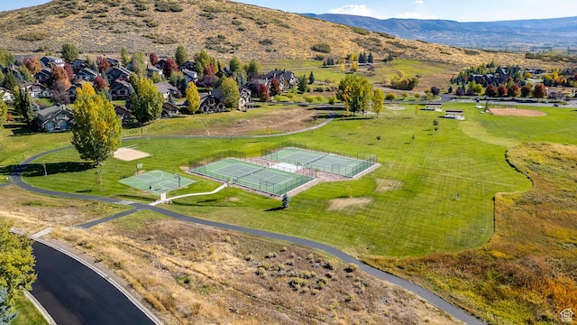 birds eye view of property featuring a mountain view