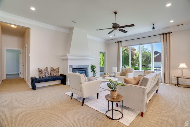 49 W Oberland Ct, Midway, UT 84049 - living area featuring light carpet, crown molding, recessed lighting, a fireplace, and a ceiling fan
