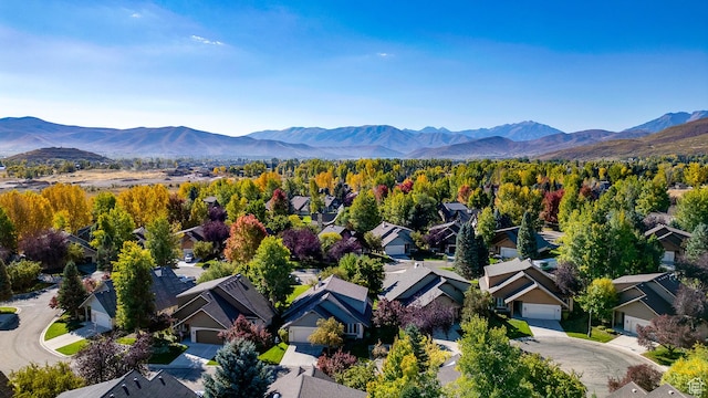 bird's eye view with a residential view and a mountain view