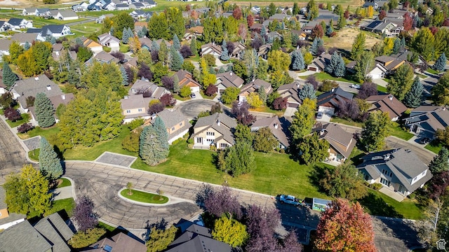 birds eye view of property with a residential view