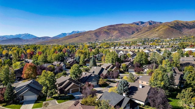 drone / aerial view featuring a mountain view and a residential view