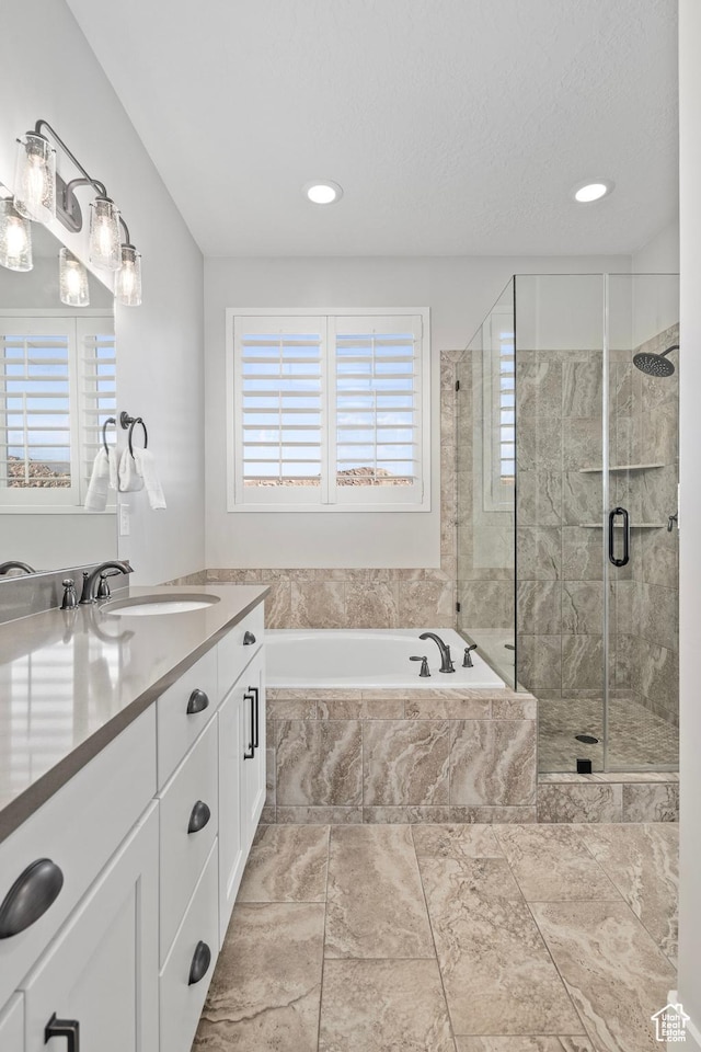 1007 S Weathervane Way, Heber City, UT 84032 - full bath featuring recessed lighting, a bath, vanity, and a stall shower