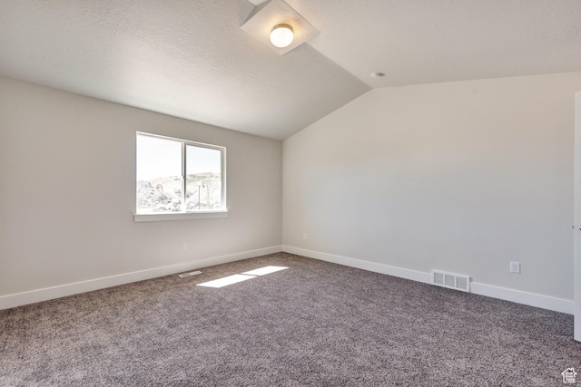 1777 S 3725th St W Unit 107, Taylor, UT 84401 - unfurnished room featuring lofted ceiling, carpet flooring, and baseboards