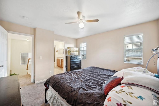 1898 W Pointe Meadow Loop, Lehi, UT 84043 - bedroom with carpet, ensuite bathroom, and a ceiling fan
