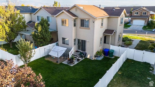 1898 W Pointe Meadow Loop, Lehi, UT 84043 - back of property featuring stucco siding, a residential view, and a patio area