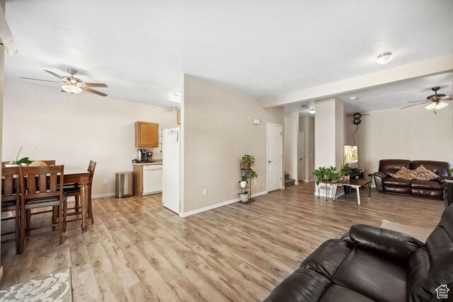 1898 W Pointe Meadow Loop, Lehi, UT 84043 - living area with a ceiling fan, light wood-style floors, and baseboards