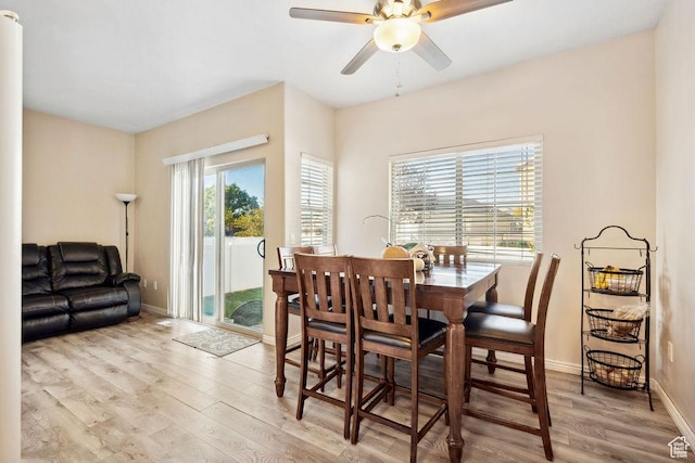 1898 W Pointe Meadow Loop, Lehi, UT 84043 - dining space featuring light wood-style flooring, ceiling fan, and baseboards
