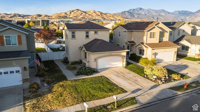 1898 W Pointe Meadow Loop, Lehi, UT 84043 - traditional-style house with a residential view, a mountain view, and a garage