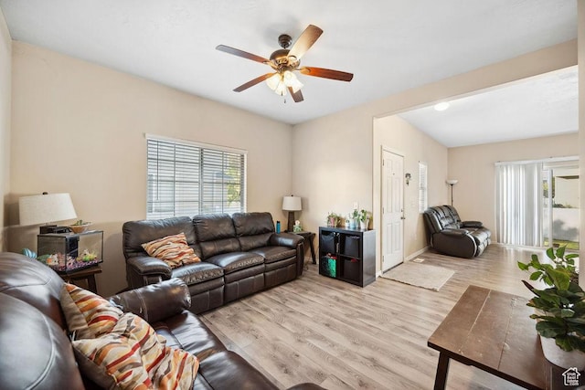 1898 W Pointe Meadow Loop, Lehi, UT 84043 - living area with healthy amount of natural light, light wood-style floors, ceiling fan, and baseboards