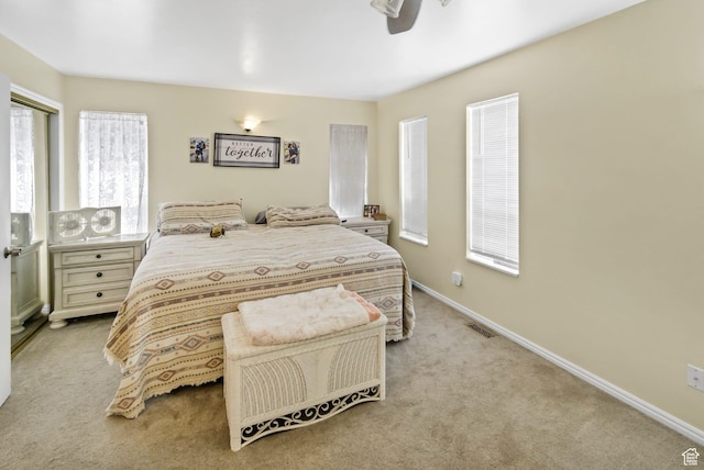 245 N 700 E, Richfield, UT 84701 - bedroom with carpet, visible vents, baseboards, and a ceiling fan