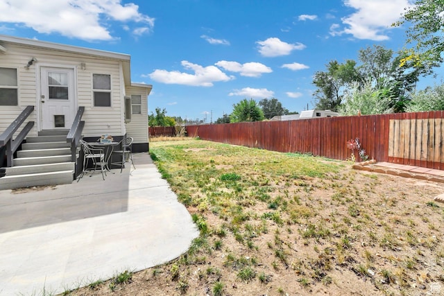245 N 700 E, Richfield, UT 84701 - view of yard featuring entry steps, a fenced backyard, and a patio area