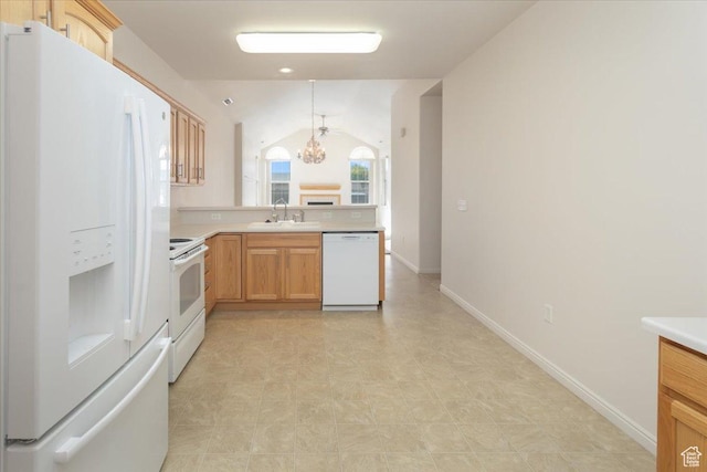 2896 W Abbey Springs Cir S, West Jordan, UT 84084 - kitchen with a peninsula, a sink, a notable chandelier, white appliances, and light countertops