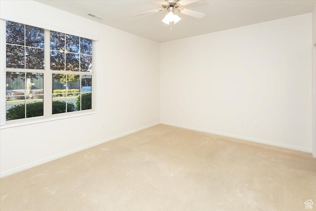 2896 W Abbey Springs Cir S, West Jordan, UT 84084 - unfurnished room with a ceiling fan, baseboards, visible vents, and light colored carpet