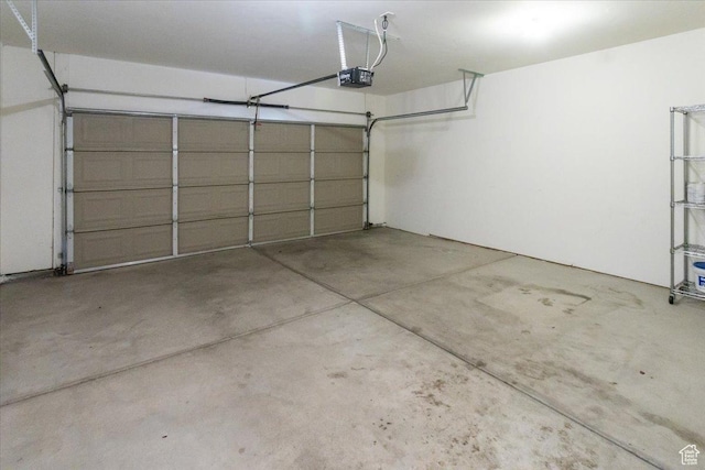2896 W Abbey Springs Cir S, West Jordan, UT 84084 - garage featuring a garage door opener